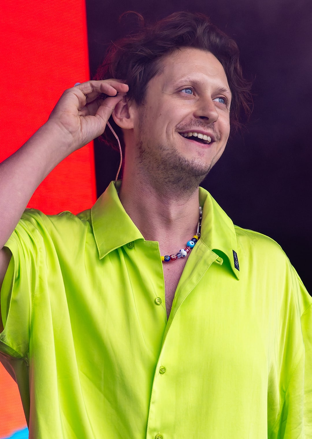 Barry Can't Swim smiling on stage at Glastonbury Festival 2024, performing on the Other Stage