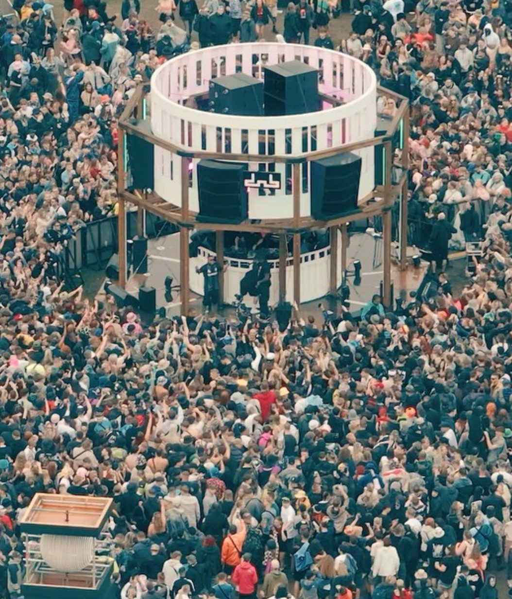 DnB Allstars Festival crowd surrounding circular stage at Gunnersbury Park London