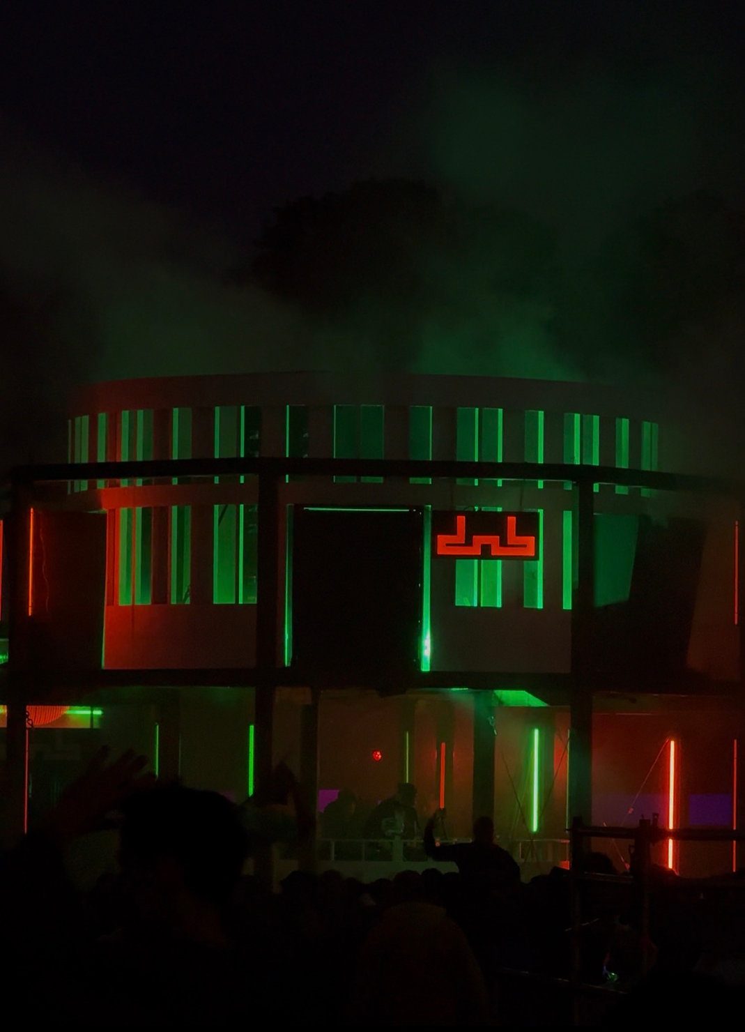 DnB Allstars event stage with green and red lighting, connected to the Facile release by MNEEMO Yaroslav Gorovoy, FLASH Anton Ditiashov and E4TEEN Christian Tooth