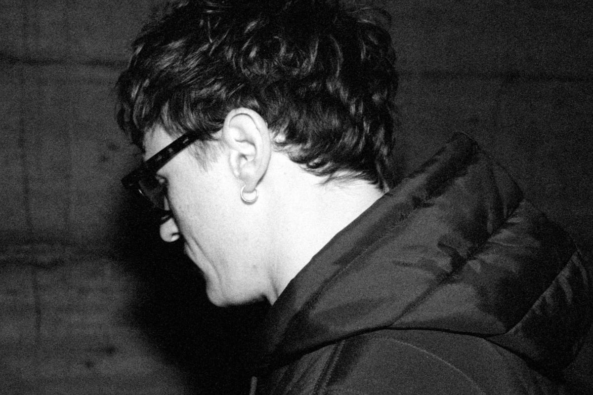 Oscar Farrell, the London future garage producer and dh2 artist, seated indoors