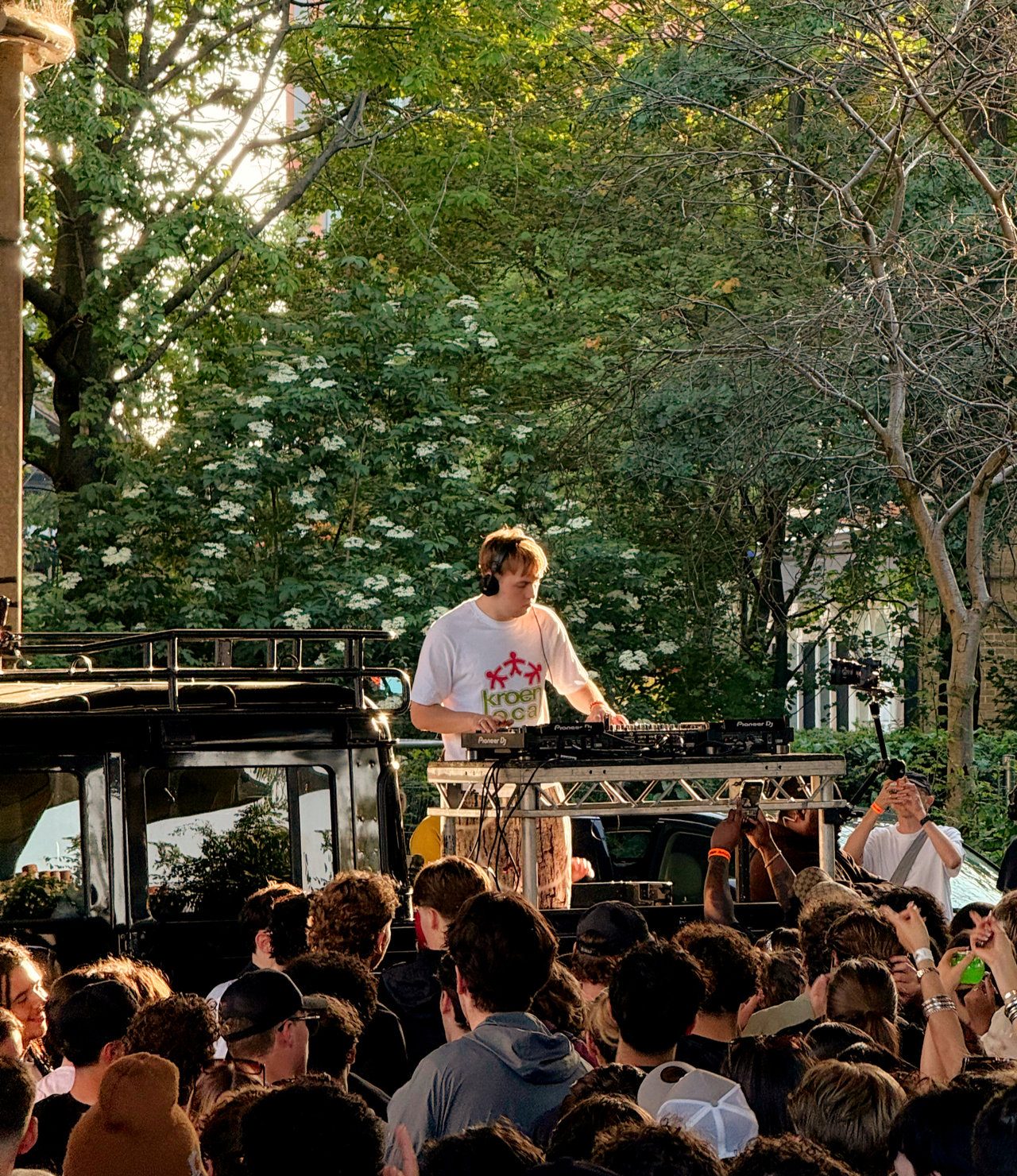 Silva Bumpa performing at the HYPA EP release party in London, DJing from the back of a pickup-style van under a concrete bridge while a packed crowd watches during the open-air event.