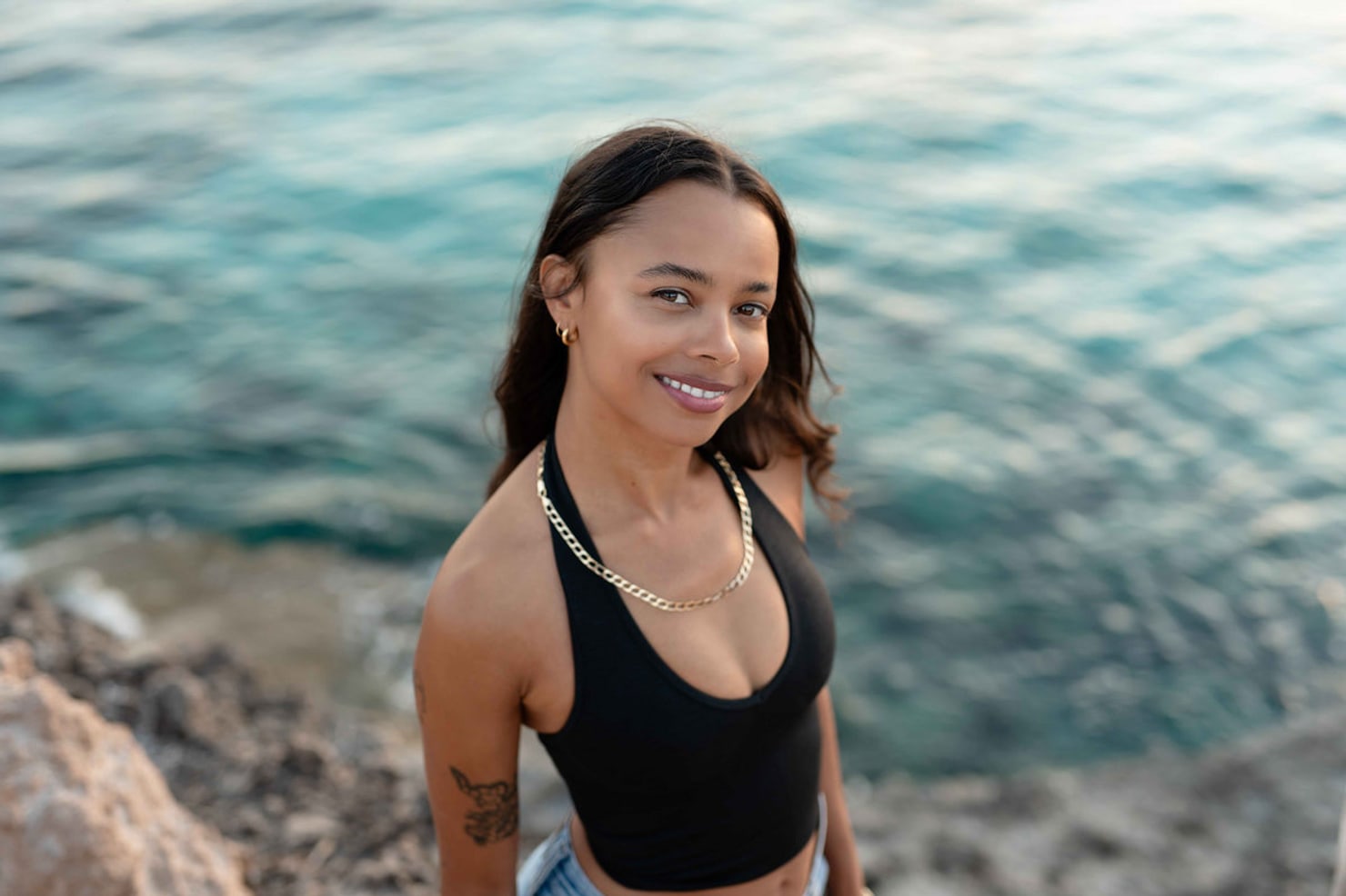 TSHA (Teisha Matthews), the London-based dance producer, by the water