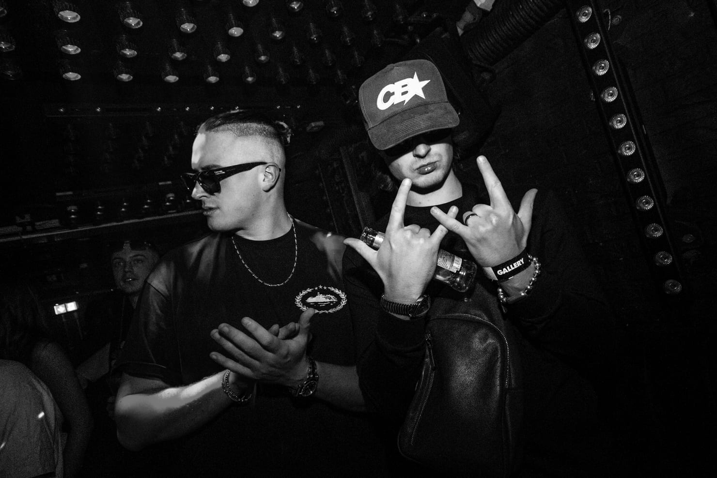 MNEEMO and CABBA LAGA behind the decks at a London UK garage night, black and white