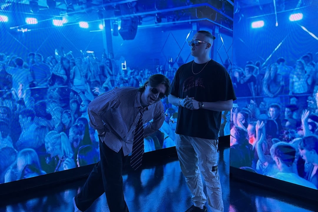 MNEEMO and CABBA LAGA above a packed dancefloor in blue light — the UK garage revival on a London floor